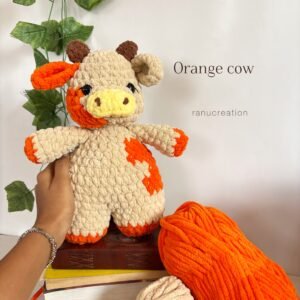 Orange cow crochet plushie